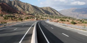 Agadir to Marrakech road trip — A7 motorway through the Atlas foothills.